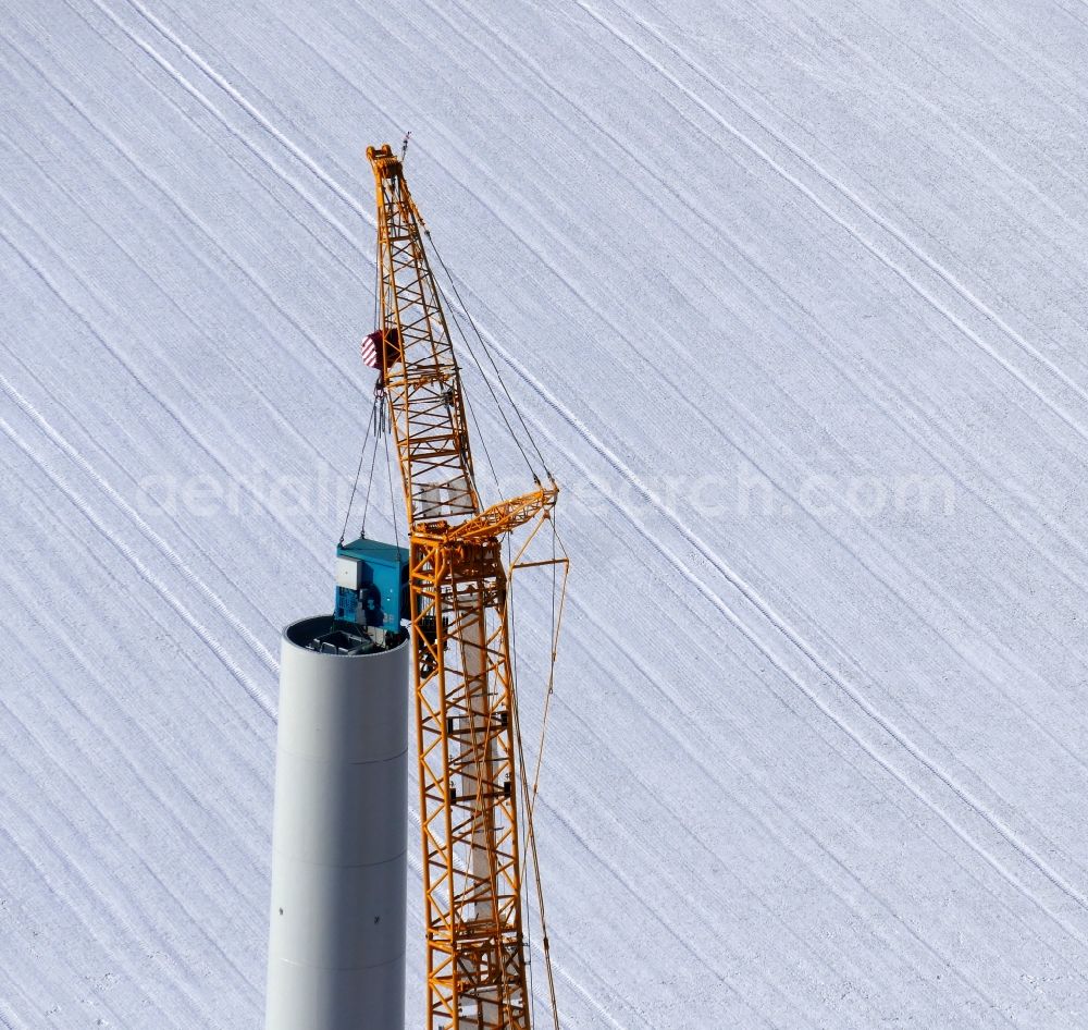 Aerial image Witzenhausen - Wintry snowy Construction site for wind turbine installation in Witzenhausen in the state Hesse, Germany