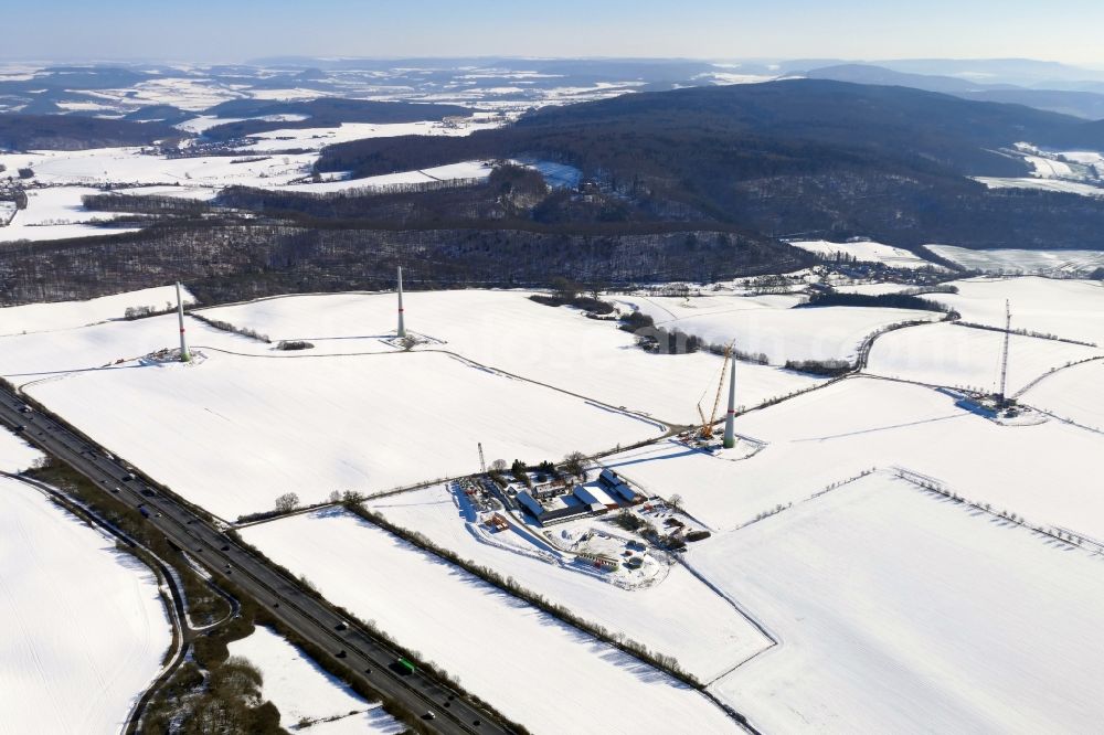 Witzenhausen from above - Wintry snowy Construction site for wind turbine installation in Witzenhausen in the state Hesse, Germany