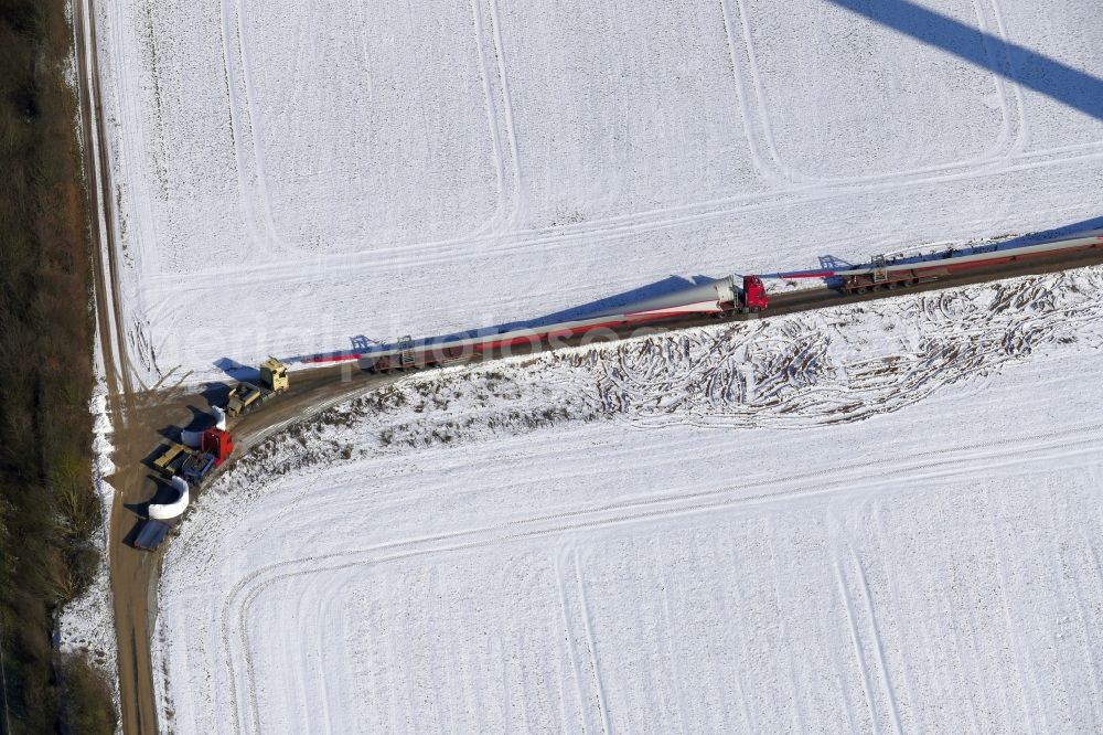 Aerial image Witzenhausen - Wintry snowy Construction site for wind turbine installation in Witzenhausen in the state Hesse, Germany