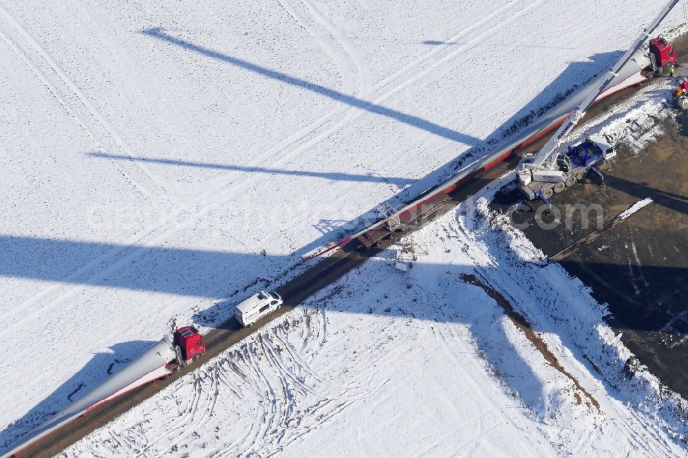 Aerial photograph Witzenhausen - Wintry snowy Construction site for wind turbine installation in Witzenhausen in the state Hesse, Germany