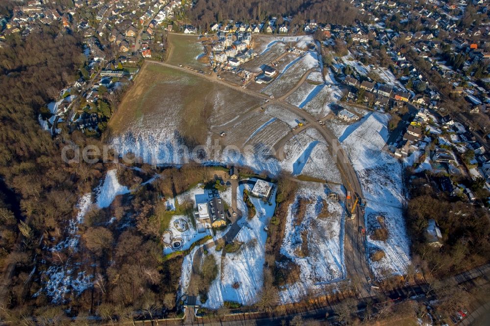 Essen from above - Wintry snowy Construction sites for new construction residential area of detached housing estate Barkhover Feldweg in the district Stadtbezirke IX in Essen in the state North Rhine-Westphalia