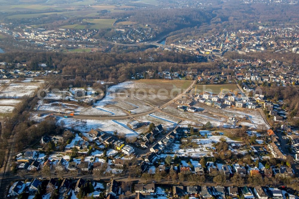 Aerial image Essen - Wintry snowy Construction sites for new construction residential area of detached housing estate Barkhover Feldweg in the district Stadtbezirke IX in Essen in the state North Rhine-Westphalia