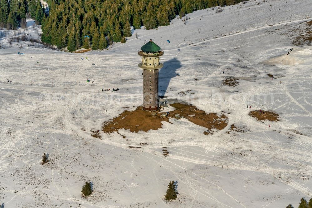 Aerial image Feldberg (Schwarzwald) - Wintry snowy structure of the observation tower Feldbergturm, ehemals Fernmeldeturm heute als Event and Aussichtsturm genutzt in Feldberg (Schwarzwald) in the state Baden-Wurttemberg, Germany