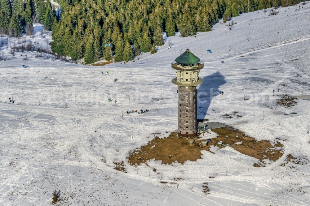 Aerial photograph Feldberg (Schwarzwald) - Wintry snowy structure of the observation tower Feldbergturm, ehemals Fernmeldeturm heute als Event and Aussichtsturm genutzt in Feldberg (Schwarzwald) in the state Baden-Wurttemberg, Germany