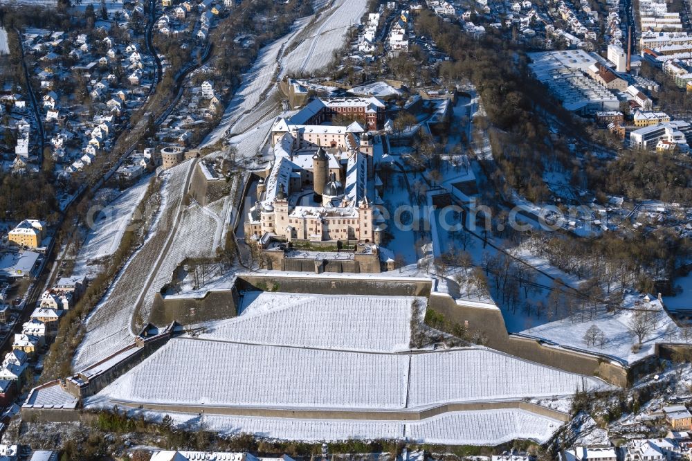 Aerial image Würzburg - Wintry snowy castle of the fortress Festung Marienberg in the district Zellerau in Wuerzburg in the state Bavaria, Germany