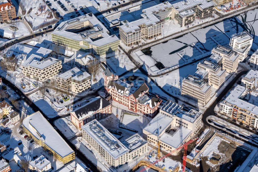 Aerial photograph Dortmund - Wintry snowy fortress Hoerder Burg at the port of the lake Phoenixsee besides the road Fassstrasse in Dortmund at Ruhrgebiet in the state North Rhine-Westphalia