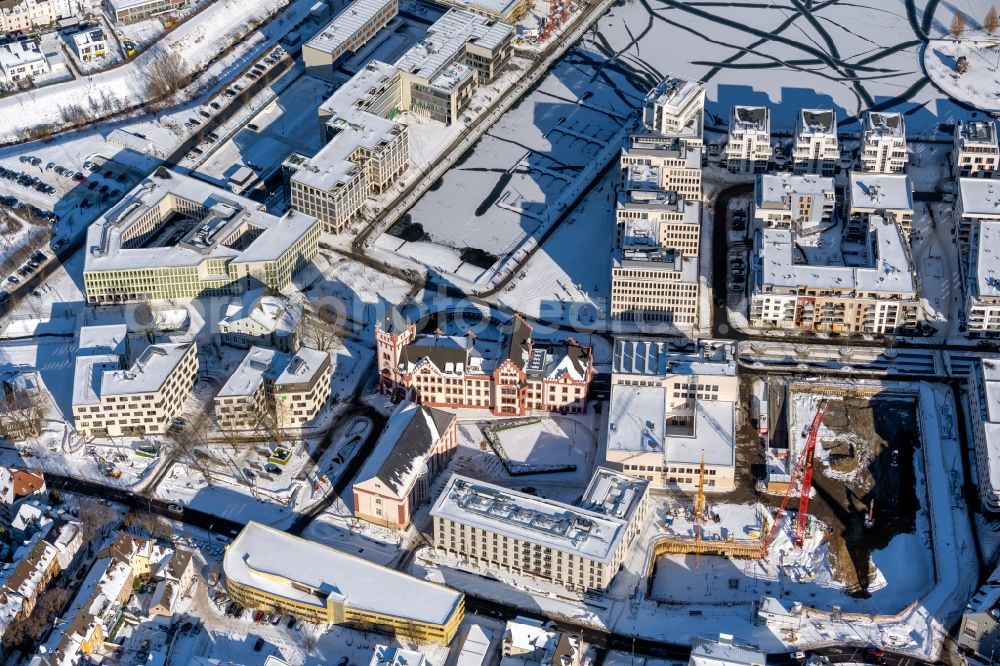 Dortmund from above - Wintry snowy fortress Hoerder Burg at the port of the lake Phoenixsee besides the road Fassstrasse in Dortmund at Ruhrgebiet in the state North Rhine-Westphalia