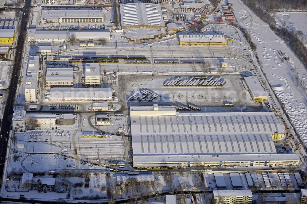 Aerial image Berlin - Wintry snowy bVG bus and train station in the district Lichtenberg in Berlin