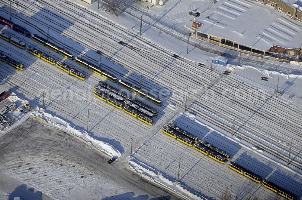 Aerial photograph Berlin - Wintry snowy bVG bus and train station in the district Lichtenberg in Berlin