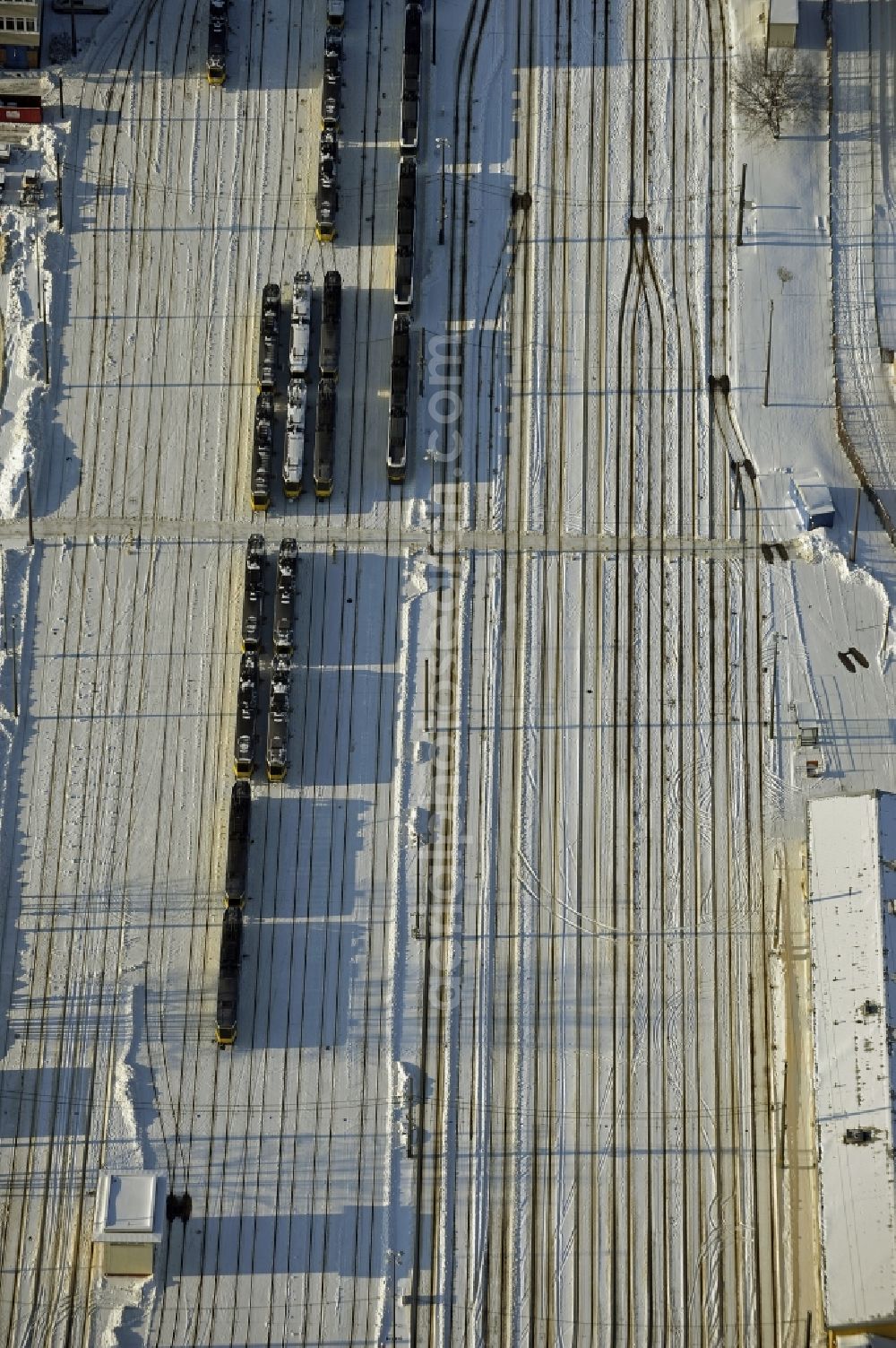 Aerial photograph Berlin - Wintry snowy bVG bus and train station in the district Lichtenberg in Berlin