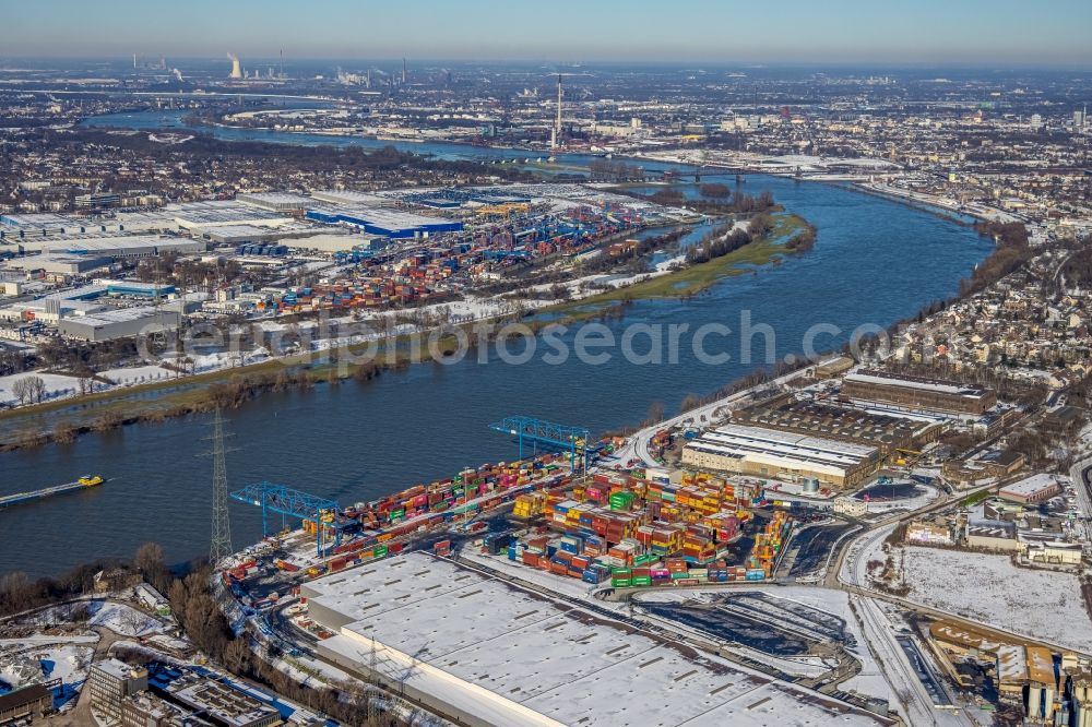 Duisburg from the bird's eye view: Wintry snowy container terminal of the Rhein-Ruhr Terminal Gesellschaft fuer Container- und Gueterumschlag mbH on Richard-Seiffert-Strasse in Duisburg in the state North Rhine-Westphalia, Germany