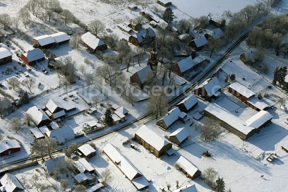 Plath from the bird's eye view: Wintry snowy village view in Plath in the state Mecklenburg - Western Pomerania, Germany