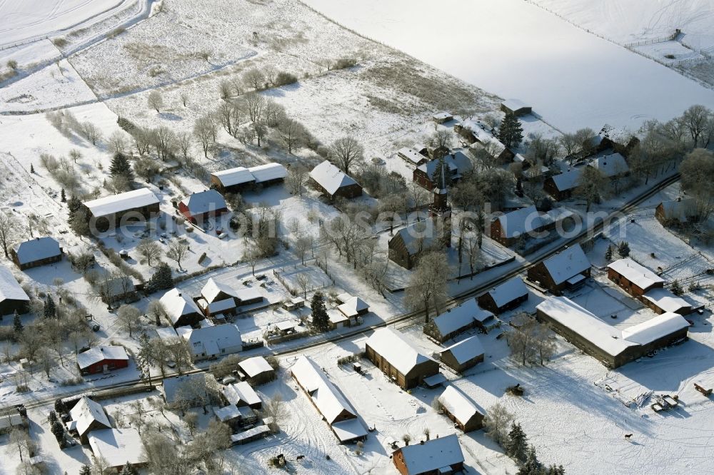 Aerial image Plath - Wintry snowy village view in Plath in the state Mecklenburg - Western Pomerania, Germany