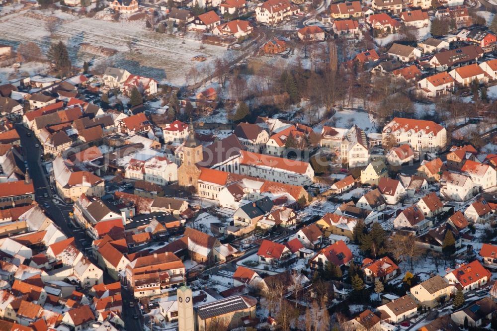 Aerial photograph Gleiszellen-Gleishorbach - Wintry snowy Village - view on the edge of agricultural fields and farmland in Gleiszellen-Gleishorbach in the state Rhineland-Palatinate, Germany