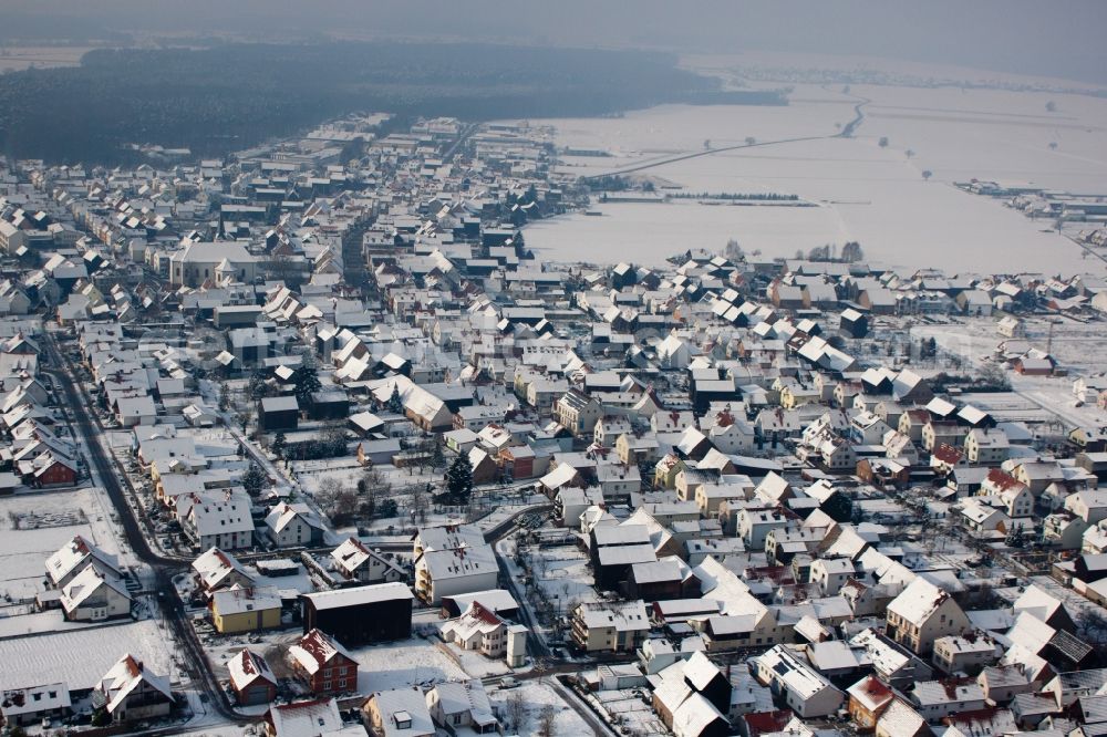 Hatzenbühl from above - Wintry snowy Village - view on the edge of agricultural fields and farmland in Hatzenbuehl in the state Rhineland-Palatinate, Germany