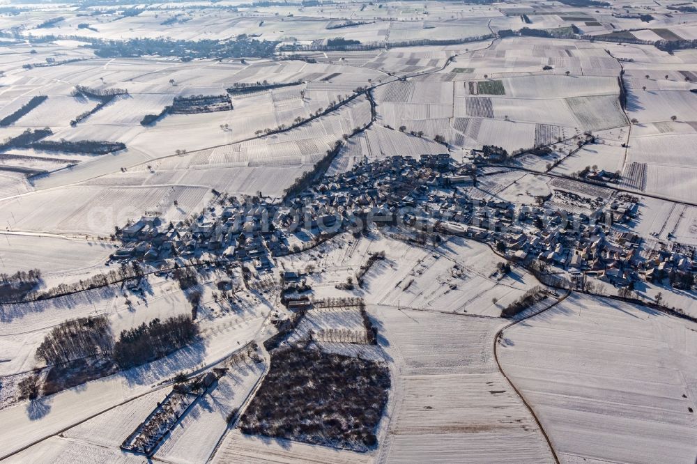 Aerial photograph Oberhausen - Wintry snowy village - view on the edge of agricultural fields and farmland in Oberhausen in the state Rhineland-Palatinate, Germany