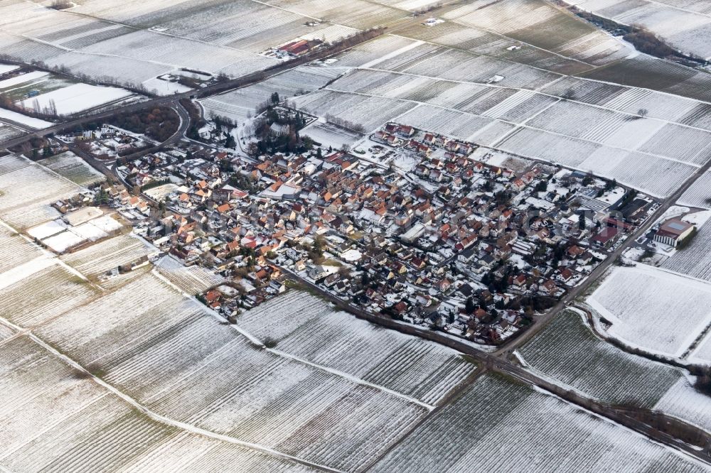 Aerial photograph Walsheim - Wintry snowy Village - view on the edge of agricultural fields and farmland in Walsheim in the state Rhineland-Palatinate, Germany