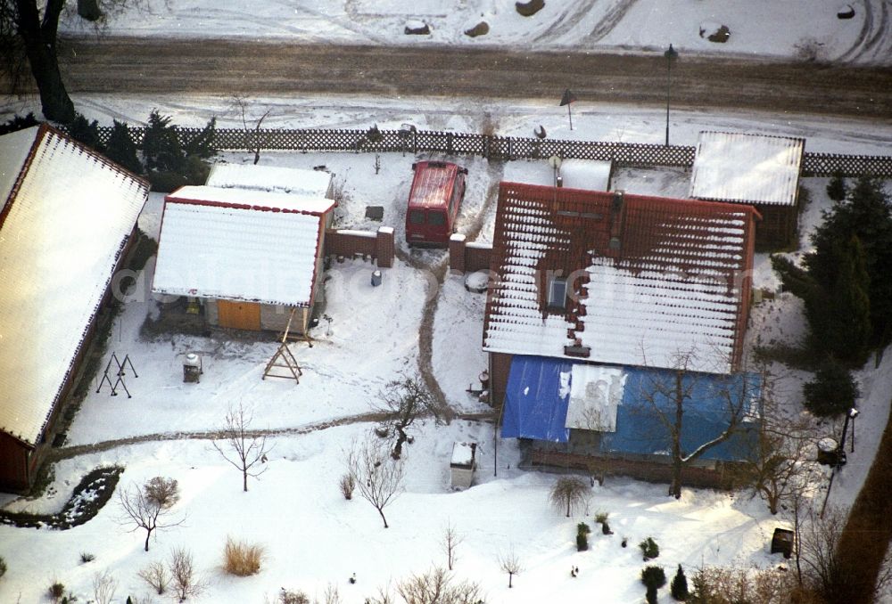 Sonnenburg from the bird's eye view: Wintry snowy village view in Sonnenburg in the state Brandenburg, Germany