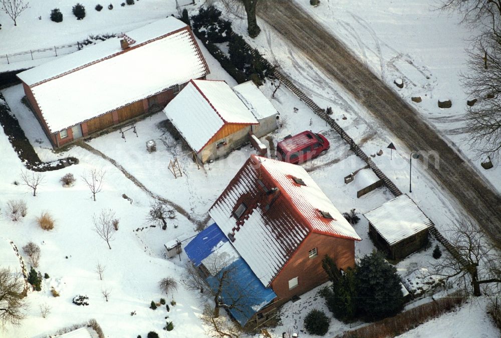 Aerial image Sonnenburg - Wintry snowy village view in Sonnenburg in the state Brandenburg, Germany