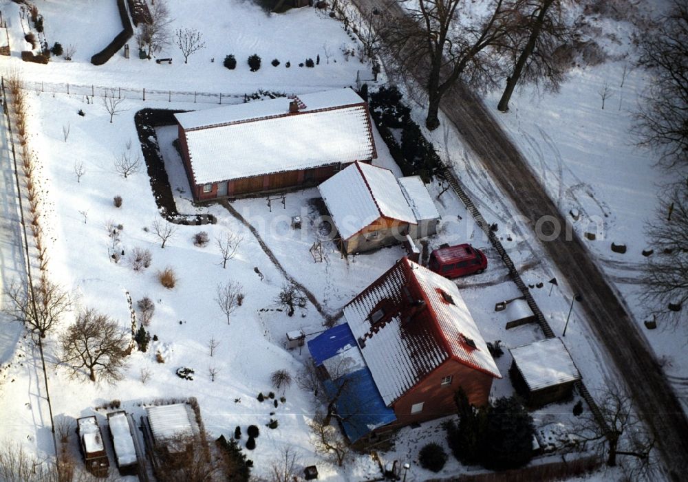 Aerial photograph Sonnenburg - Wintry snowy village view in Sonnenburg in the state Brandenburg, Germany