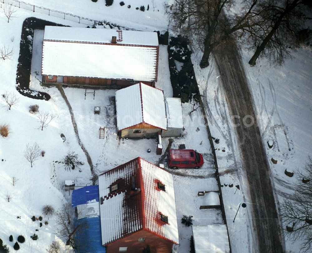 Sonnenburg from above - Wintry snowy village view in Sonnenburg in the state Brandenburg, Germany