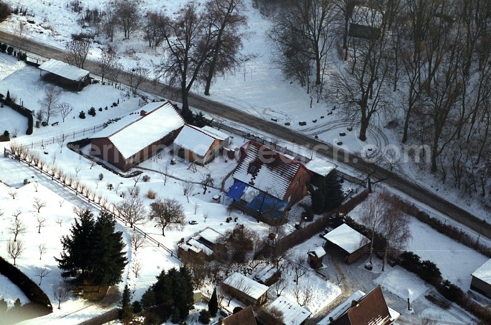 Sonnenburg from the bird's eye view: Wintry snowy village view in Sonnenburg in the state Brandenburg, Germany