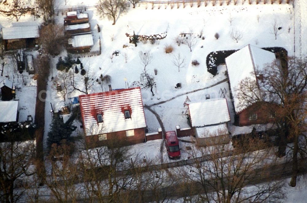 Aerial image Sonnenburg - Wintry snowy village view in Sonnenburg in the state Brandenburg, Germany