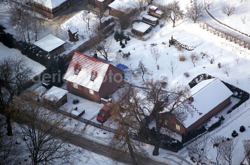 Aerial photograph Sonnenburg - Wintry snowy village view in Sonnenburg in the state Brandenburg, Germany