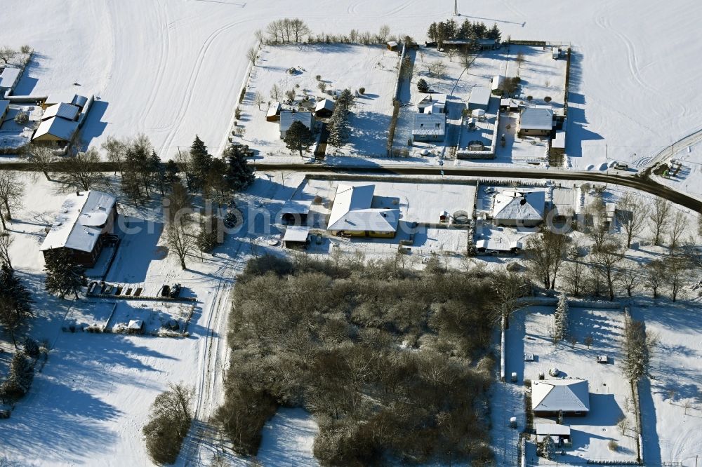 Aerial image Wüsteney - Wintry snowy village view in Wuesteney in the state Mecklenburg - Western Pomerania, Germany