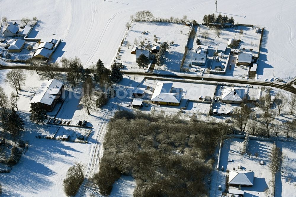 Aerial photograph Wüsteney - Wintry snowy village view in Wuesteney in the state Mecklenburg - Western Pomerania, Germany