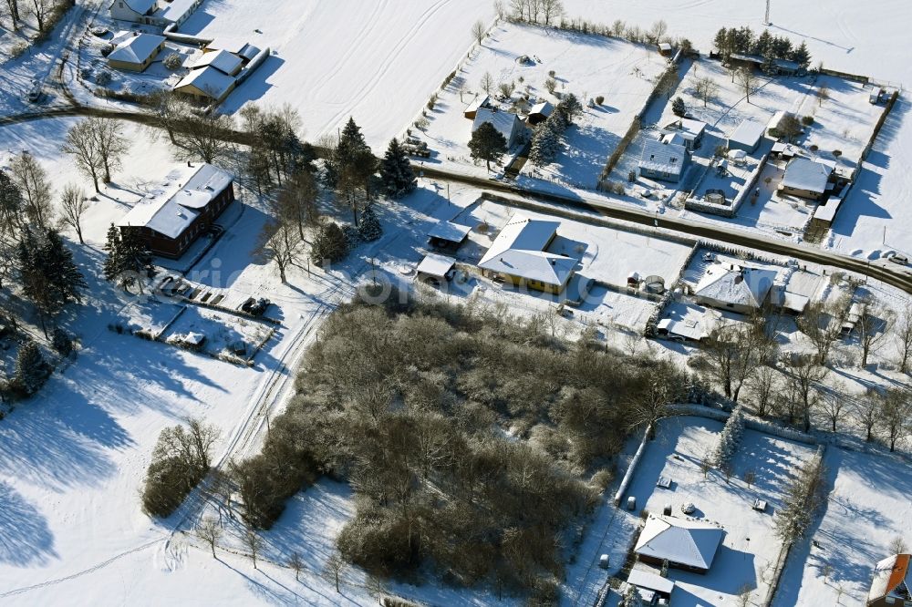 Wüsteney from above - Wintry snowy village view in Wuesteney in the state Mecklenburg - Western Pomerania, Germany