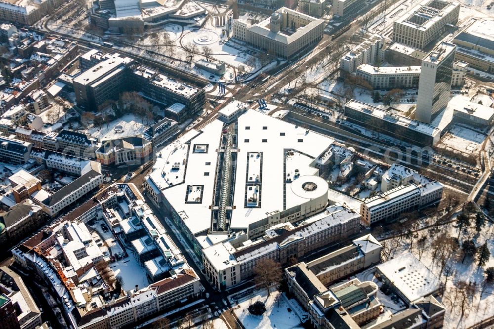 Aerial image Karlsruhe - Wintry snowy Building of the shopping center Ettlinger Tor Zentrum in Karlsruhe in the state Baden-Wuerttemberg, Germany