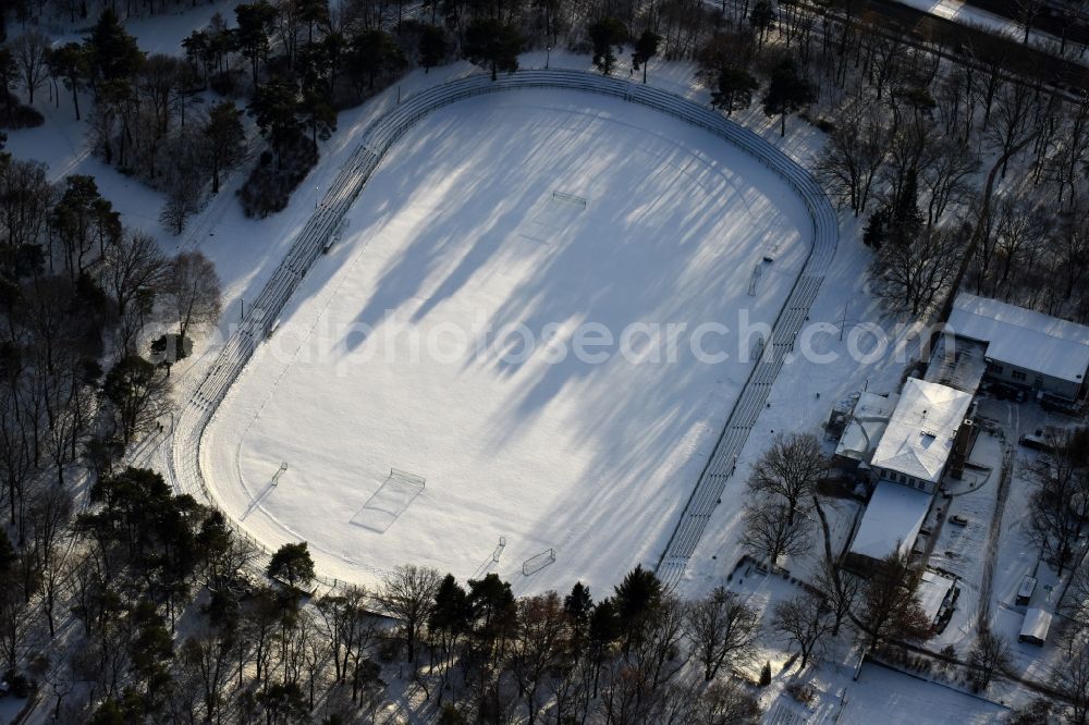 Berlin from the bird's eye view: Wintry snowy ensemble of sports grounds Sjc Arena An der Wuhlheide in the district Oberschoeneweide in Berlin