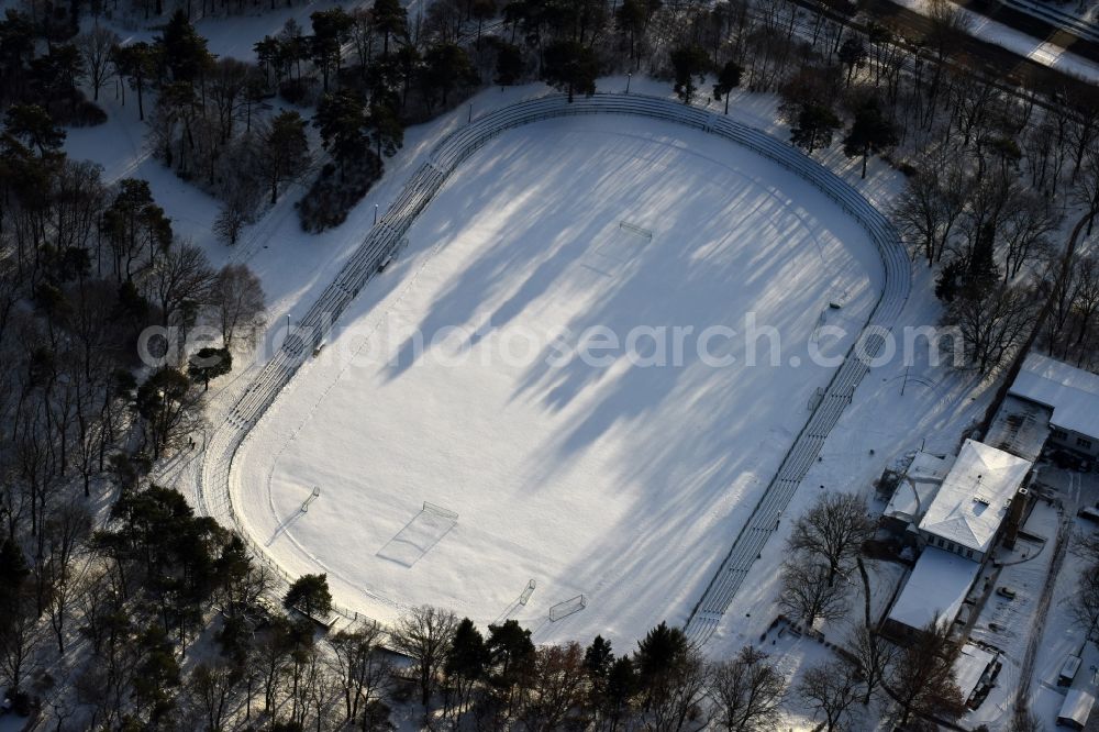 Aerial image Berlin - Wintry snowy ensemble of sports grounds Sjc Arena An der Wuhlheide in the district Oberschoeneweide in Berlin