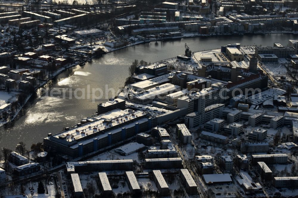 Aerial photograph Berlin - Wintry snowy development area of former industrial and commercial area Ostendstrasse in the district Oberschoeneweide in Berlin