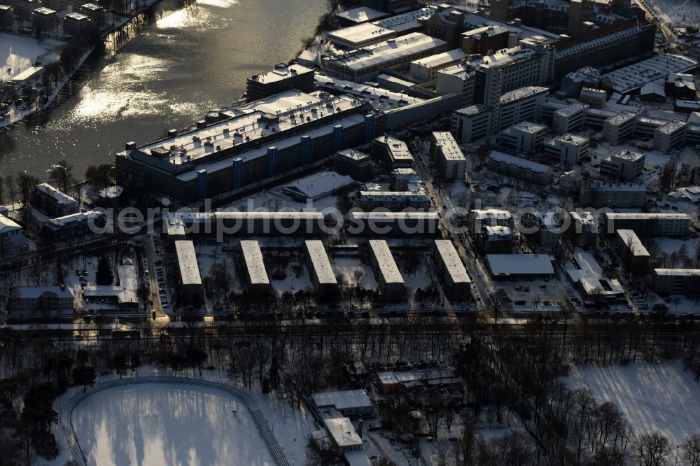 Berlin from above - Wintry snowy development area of former industrial and commercial area Ostendstrasse in the district Oberschoeneweide in Berlin