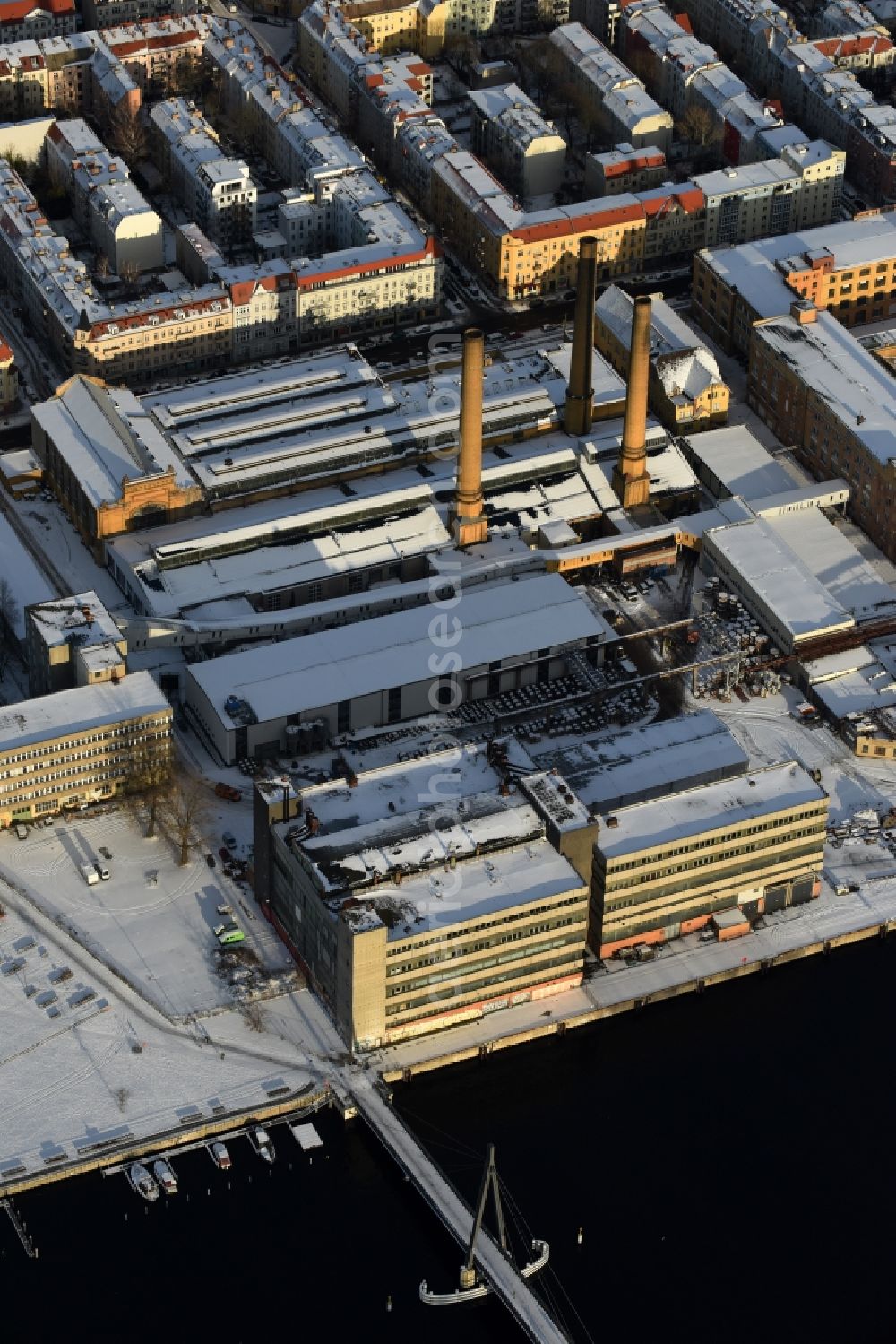 Aerial photograph Berlin - Wintry snowy development area of industrial wasteland areal formerly Kabelwerk Oberspree (KWO) in the district Oberschoeneweide in Berlin