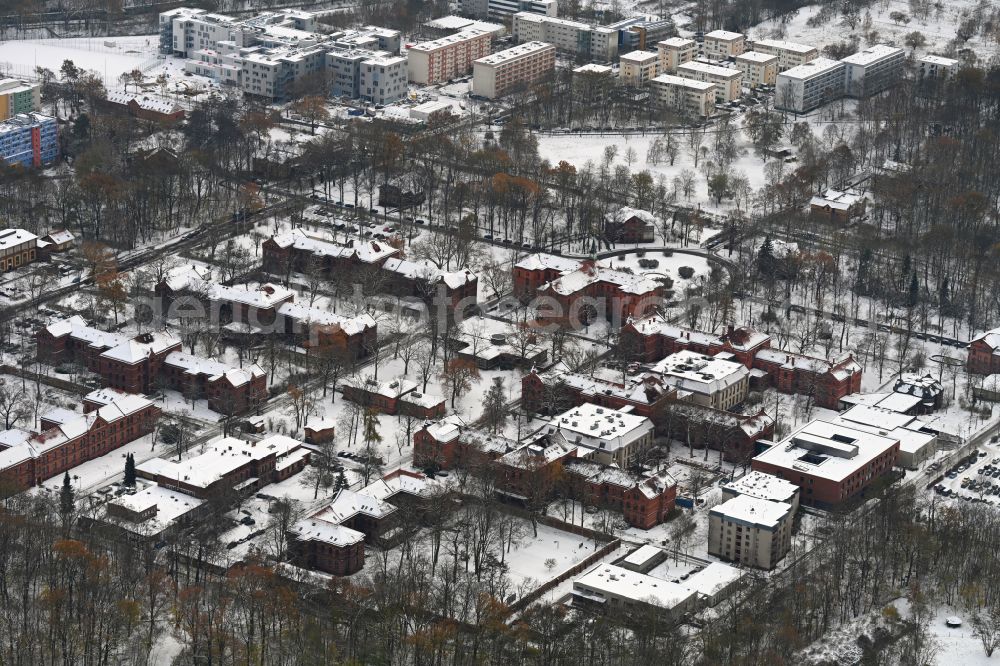 Aerial image Berlin - Wintry snowy evangelical Hospital Queen Elisabeth Herzberge in Berlin Lichtenberg