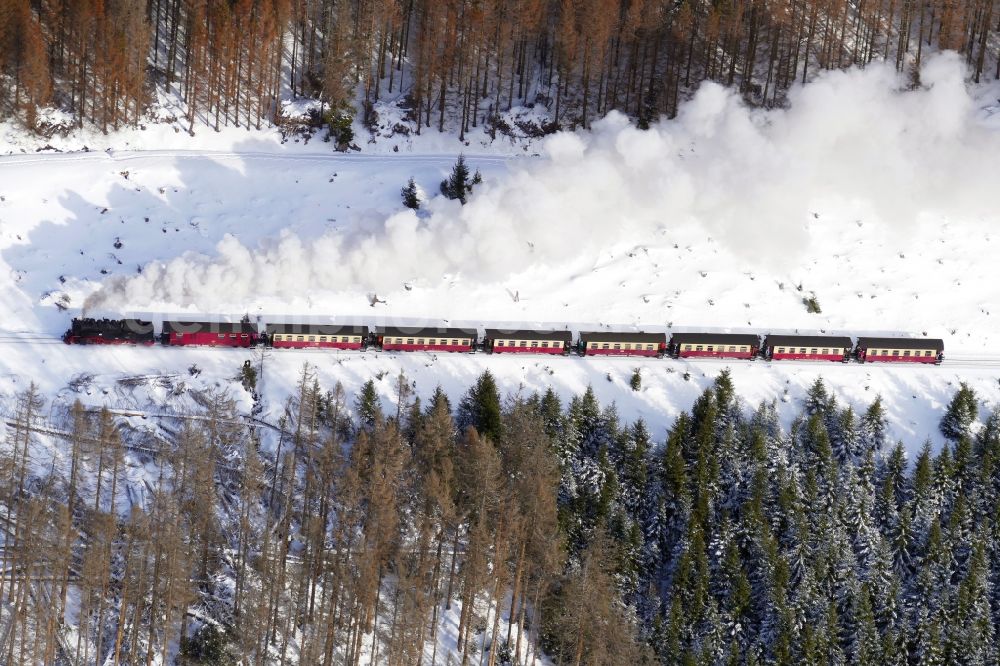 Aerial photograph Schierke - Wintry snowy ride a train in Schierke in the state Saxony-Anhalt, Germany