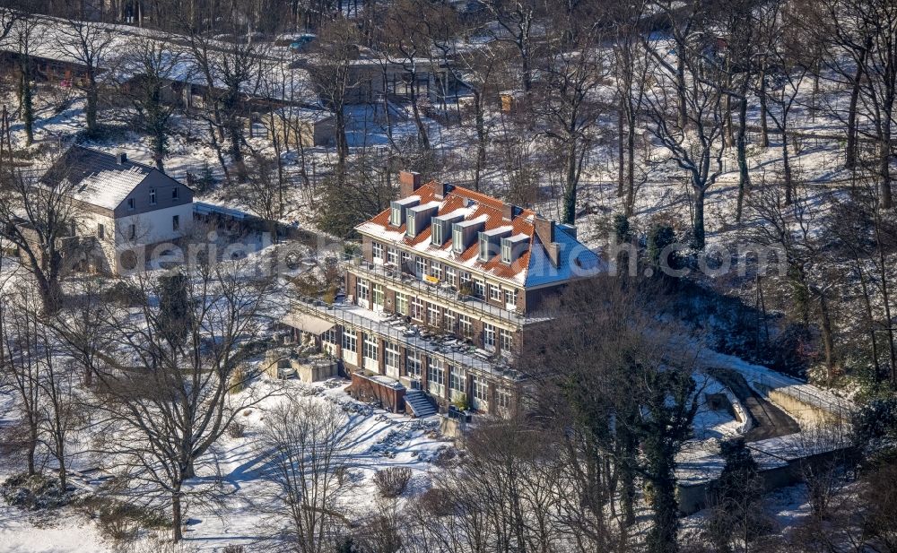 Witten from above - Wintry snowy facade of the monument Ehemaliges Kinderheim in Witten at Ruhrgebiet in the state North Rhine-Westphalia, Germany