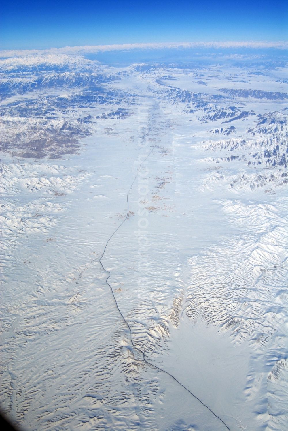 Kandahar from the bird's eye view: Wintry snowy rock and mountain landscape Hindu Kush in Kandahar in Afghanistan