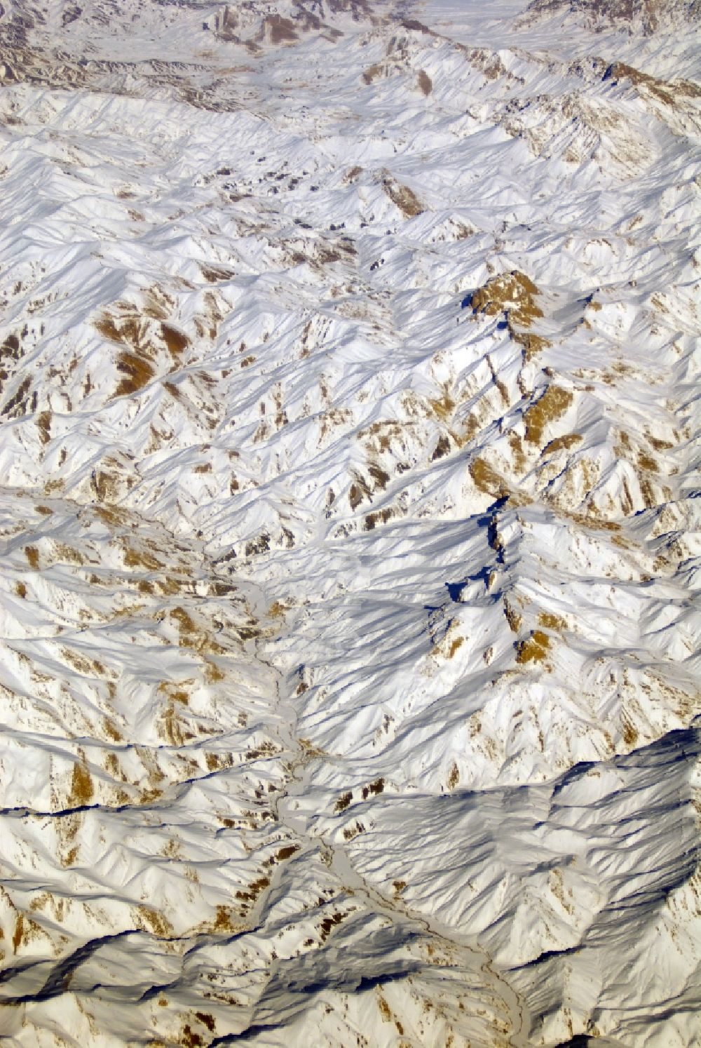 Kandahar from above - Wintry snowy rock and mountain landscape Hindu Kush in Kandahar in Afghanistan