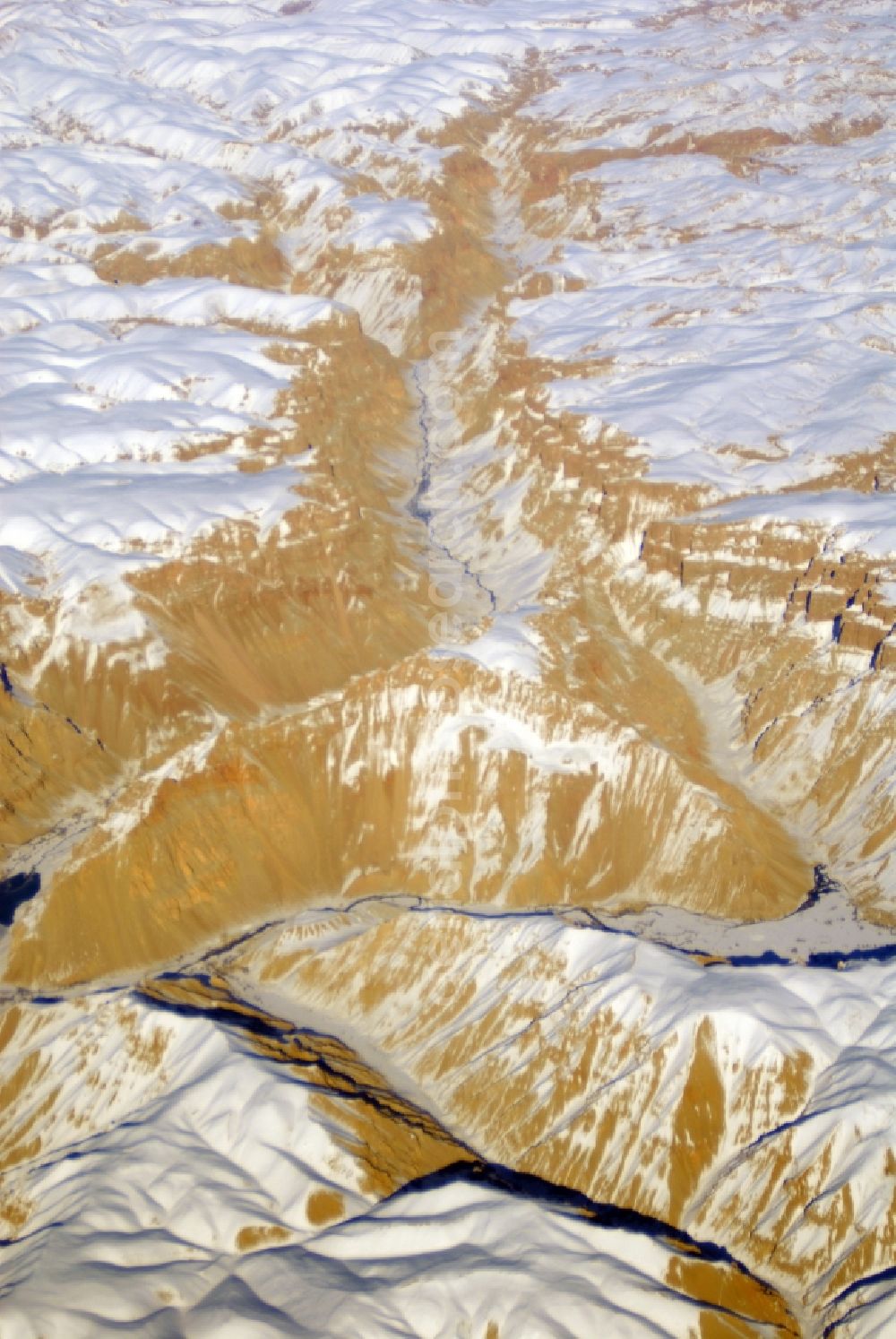 Aerial photograph Kandahar - Wintry snowy rock and mountain landscape Hindu Kush in Kandahar in Afghanistan