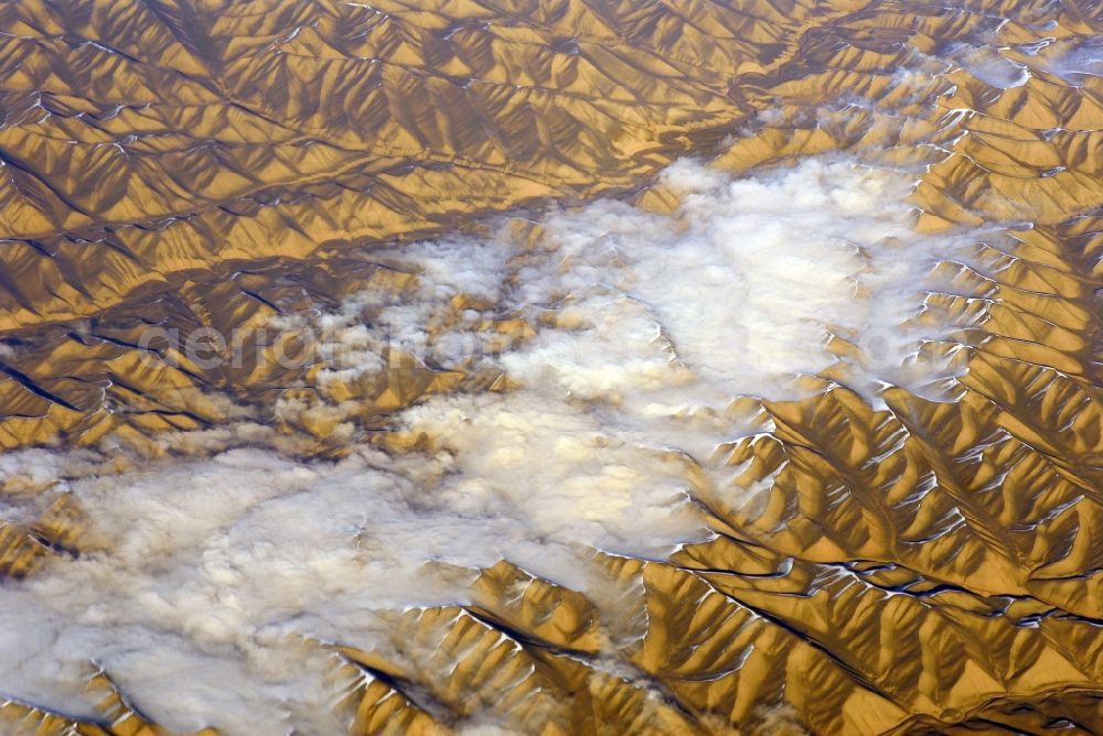 Kandahar from above - Wintry snowy rock and mountain landscape Hindu Kush in Kandahar in Afghanistan