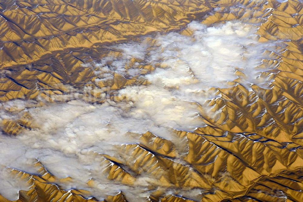 Kandahar from the bird's eye view: Wintry snowy rock and mountain landscape Hindu Kush in Kandahar in Afghanistan