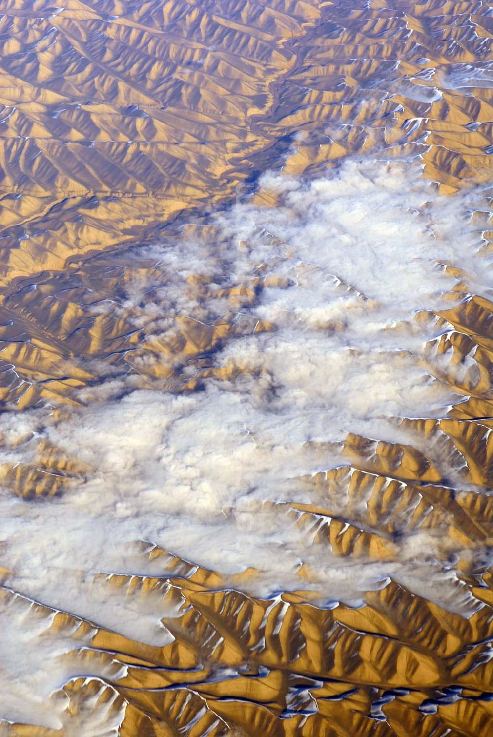 Kandahar from above - Wintry snowy rock and mountain landscape Hindu Kush in Kandahar in Afghanistan