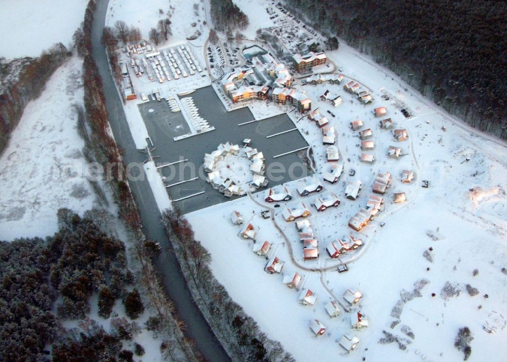 Kleinzerlang from above - Wintry snowy holiday house plant of the park Marina Wolfsbruch in Kleinzerlang in the state Brandenburg, Germany