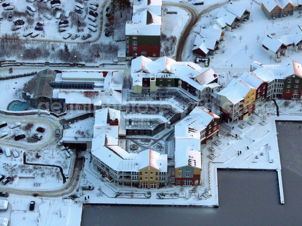 Kleinzerlang from above - Wintry snowy holiday house plant of the park Marina Wolfsbruch in Kleinzerlang in the state Brandenburg, Germany