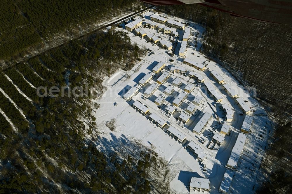 Gelbensande from above - Wintry snowy building of an apartment building used as an apartment complex Kuestenwald in the district Mueritz in Gelbensande in the state Mecklenburg - Western Pomerania, Germany