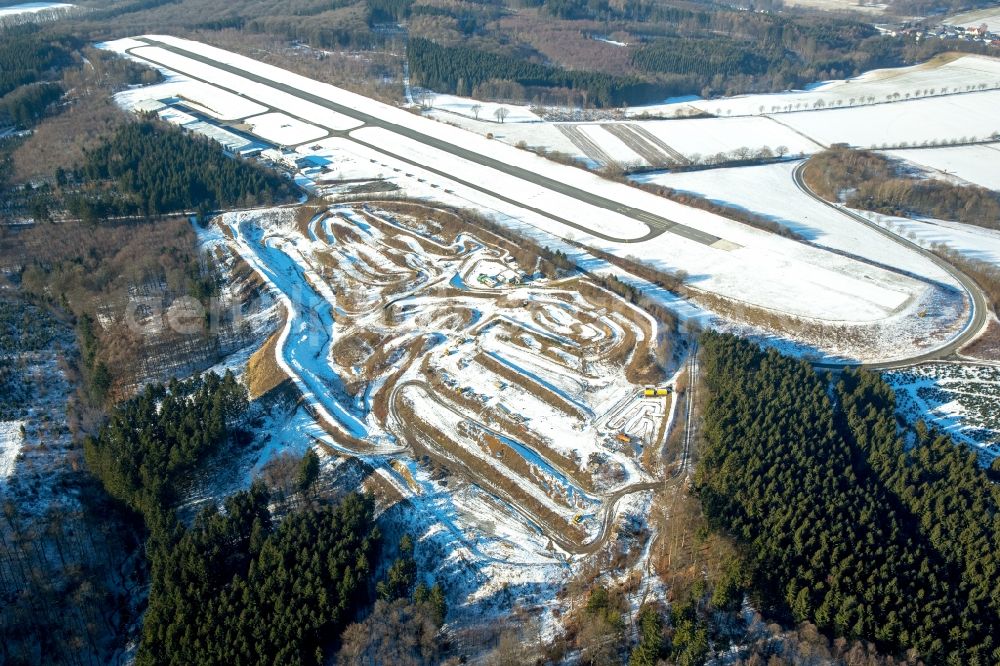 Aerial image Wickede (Ruhr) - Wintry snowy runway with tarmac terrain of airfield Flugplatz Arnsberg Menden in Wickede (Ruhr) in the state North Rhine-Westphalia